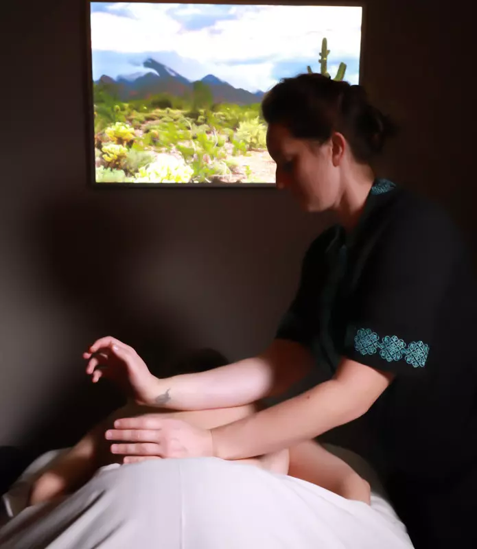 Deep tissue massage therapist working on a client at Inspire Day Spa
